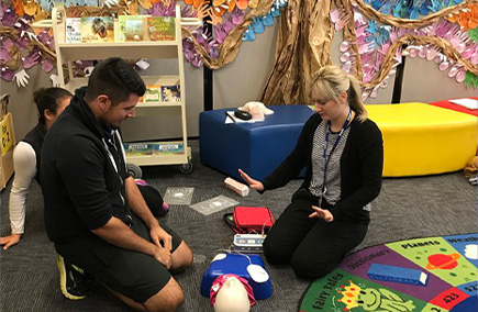 Using AED during onsite first aid course with WJS Training at early learning centre.