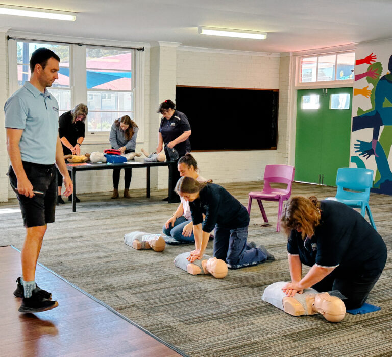 First Aid and CPR practice happening in Armadale company office