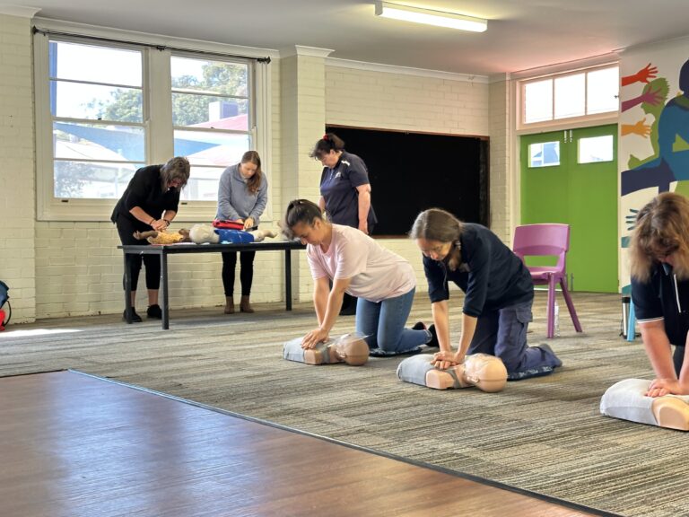 Performing CPR refresher at school by WJS Training